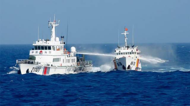 中国海警驱逐越南海警，维护海洋秩序与领土完整的坚定立场，中国海警坚决维护海洋秩序与领土完整，驱逐越南海警，展示坚定立场