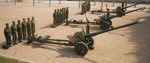 揭秘中国强大的火力支柱,54式122毫米榴弹炮,揭秘中国强大的火力支柱,54式榴弹炮的威力与特点