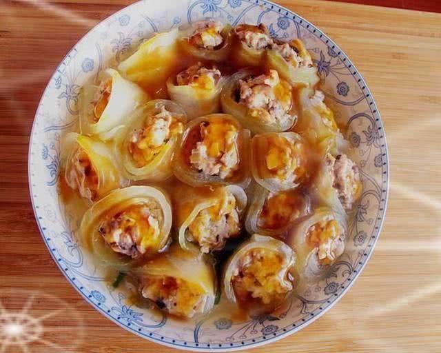 红烧狮子头，传统美食的魅力与制作方法，传统美食红烧狮子头的魅力与制作方法详解